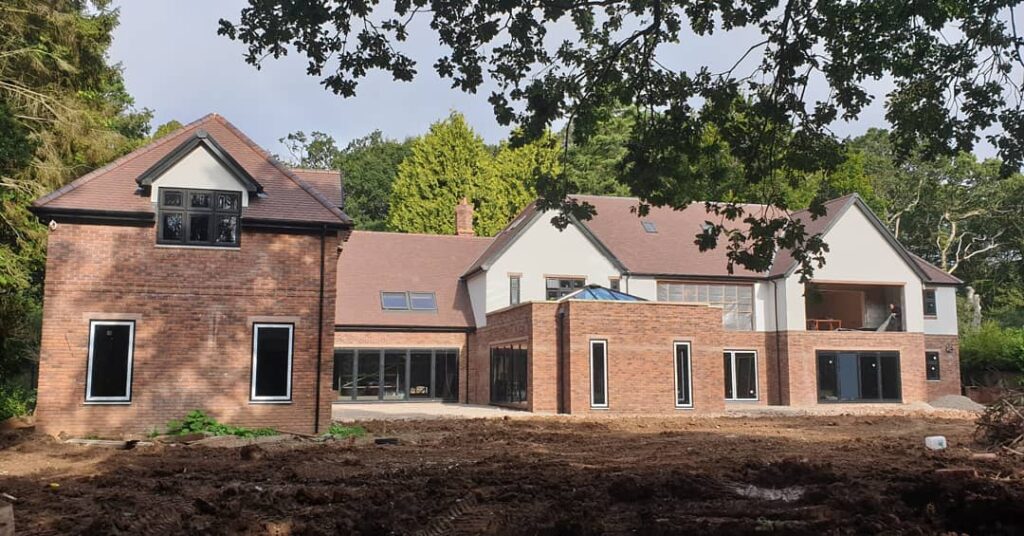 Modern new build house in a building site environment